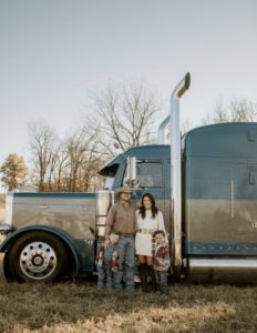 family by their semi truck