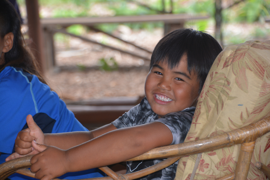 young boy smiling